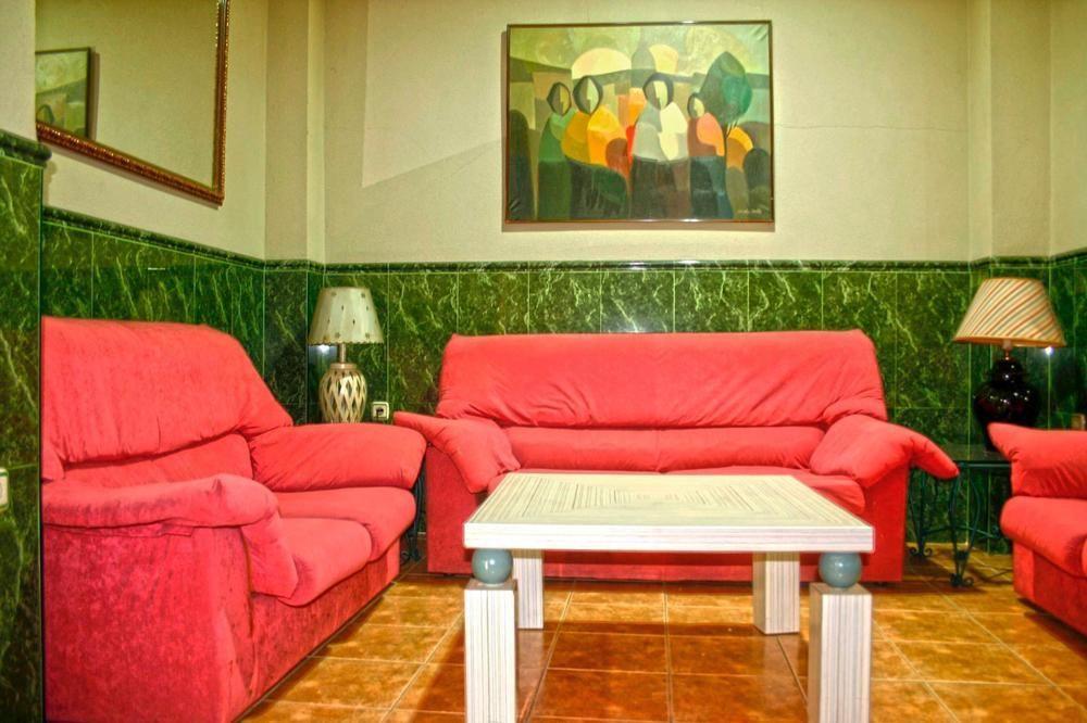 Hostal La Casa De Enfrente Малага Экстерьер фото